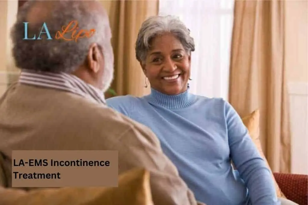 Couple sat smiling at each other - LA-EMS treatment Berkhamsted